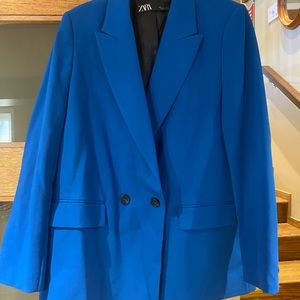 Blue double breasted blazer.